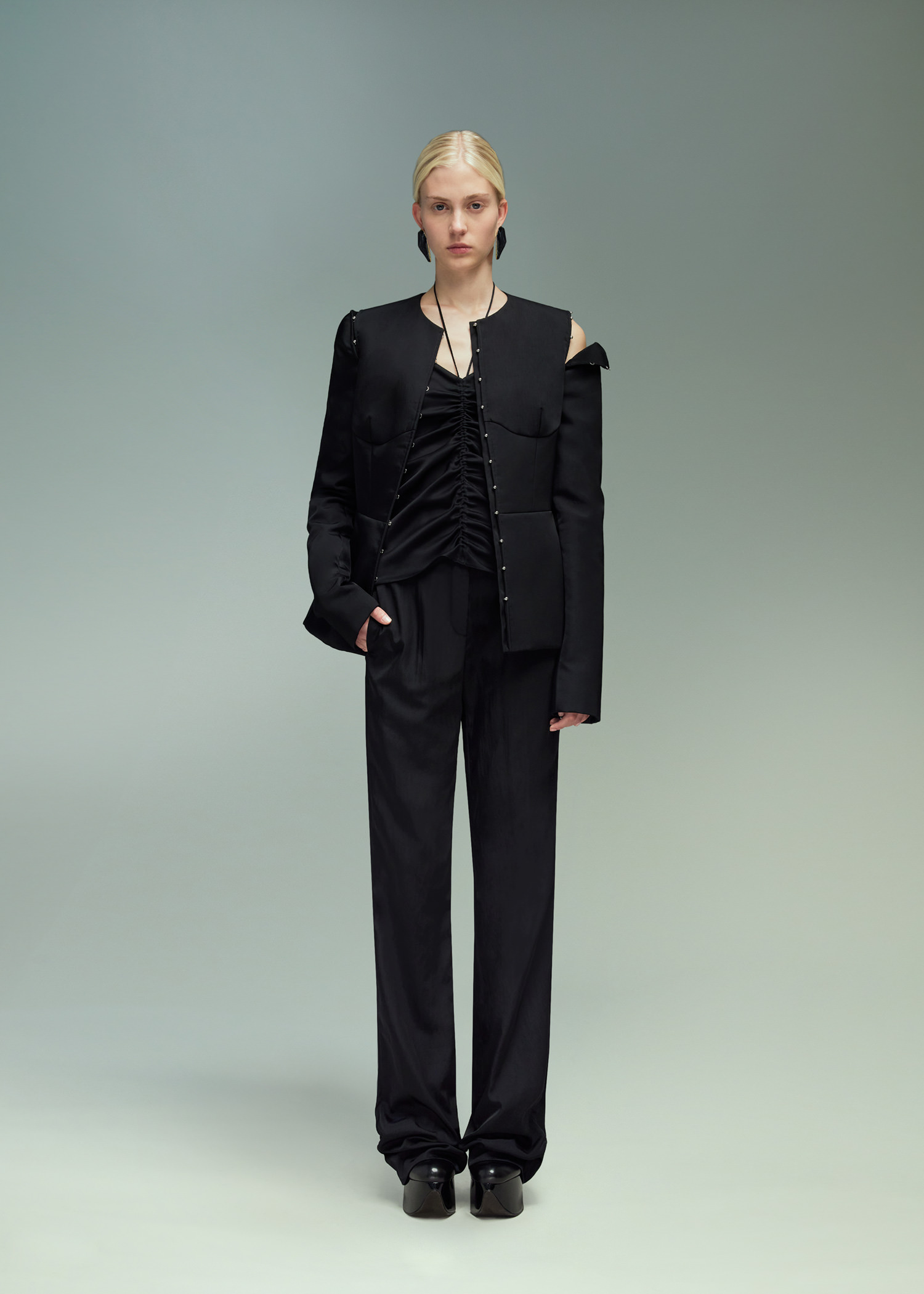 DEL CORE: SCULPTED JACKET WITH MUSHROOM HOOKS