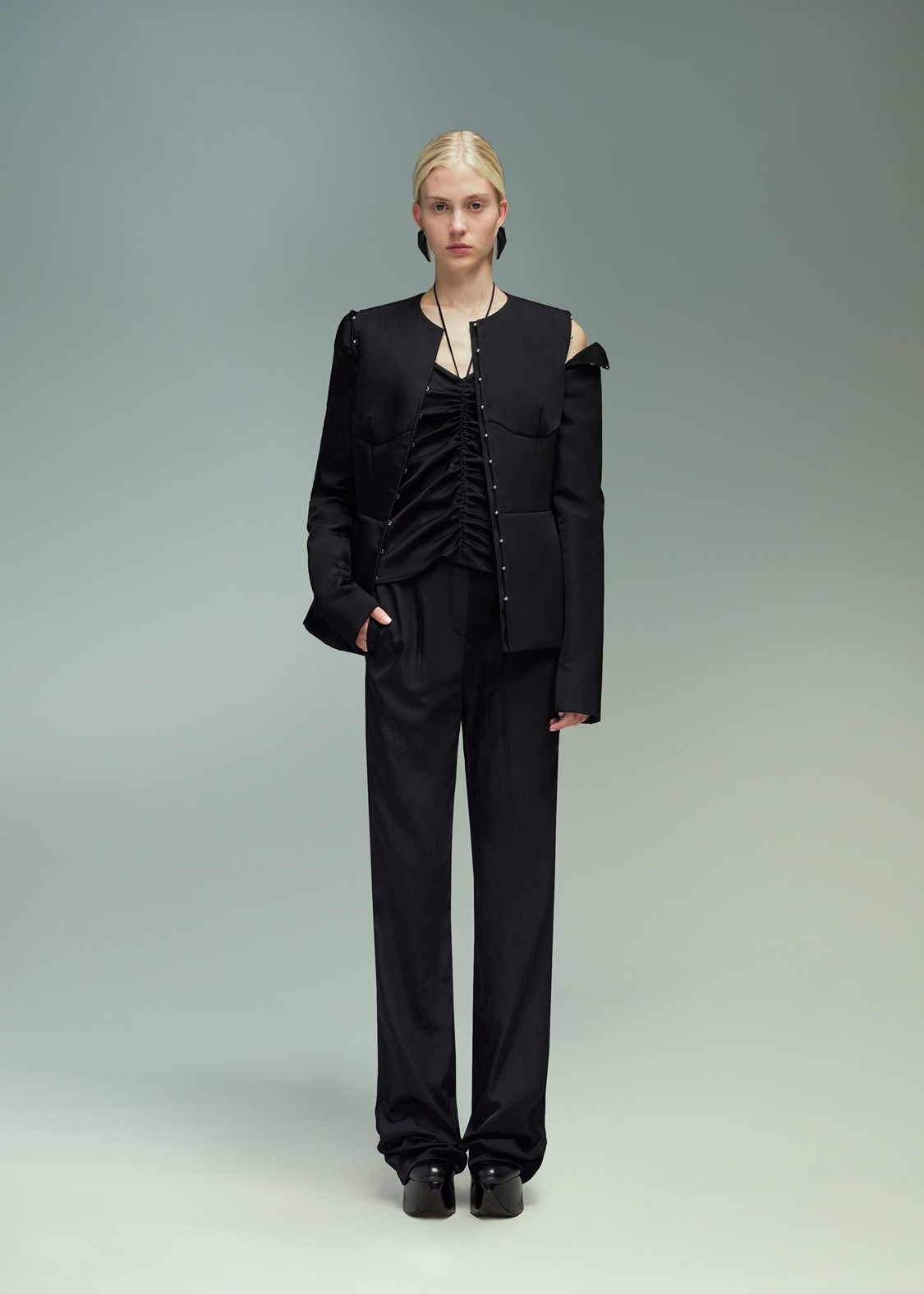 DEL CORE: SCULPTED JACKET WITH MUSHROOM HOOKS