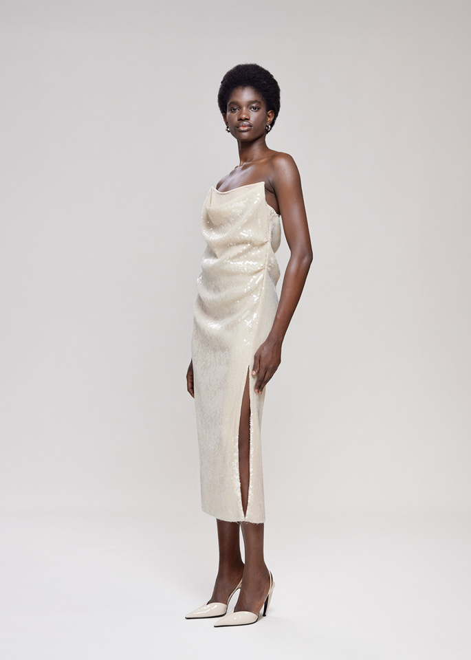DEL CORE: BUSTIER DRAPED SEQUIN DRESS WITHTOPSTITCH CORSET AND SPLIT ON THE SIDE