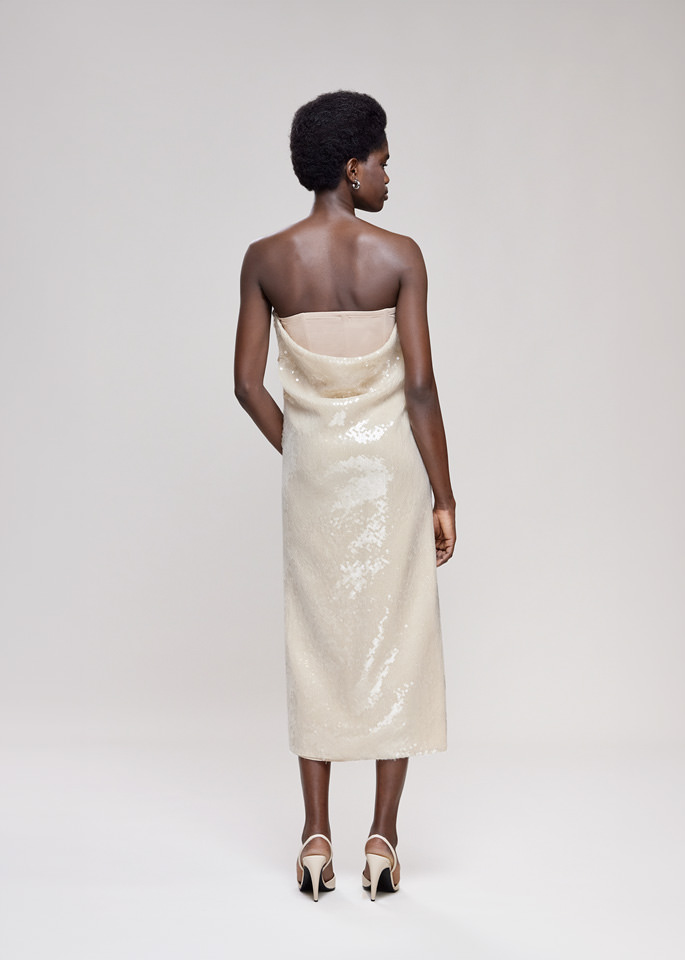 DEL CORE: BUSTIER DRAPED SEQUIN DRESS WITHTOPSTITCH CORSET AND SPLIT ON THE SIDE