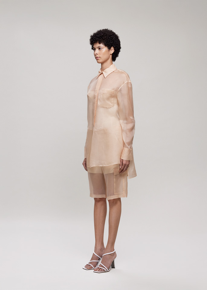 DEL CORE: SHIRT LONGER ON THE BACKWITH FITTED WAIST AND SIDE SPLIT