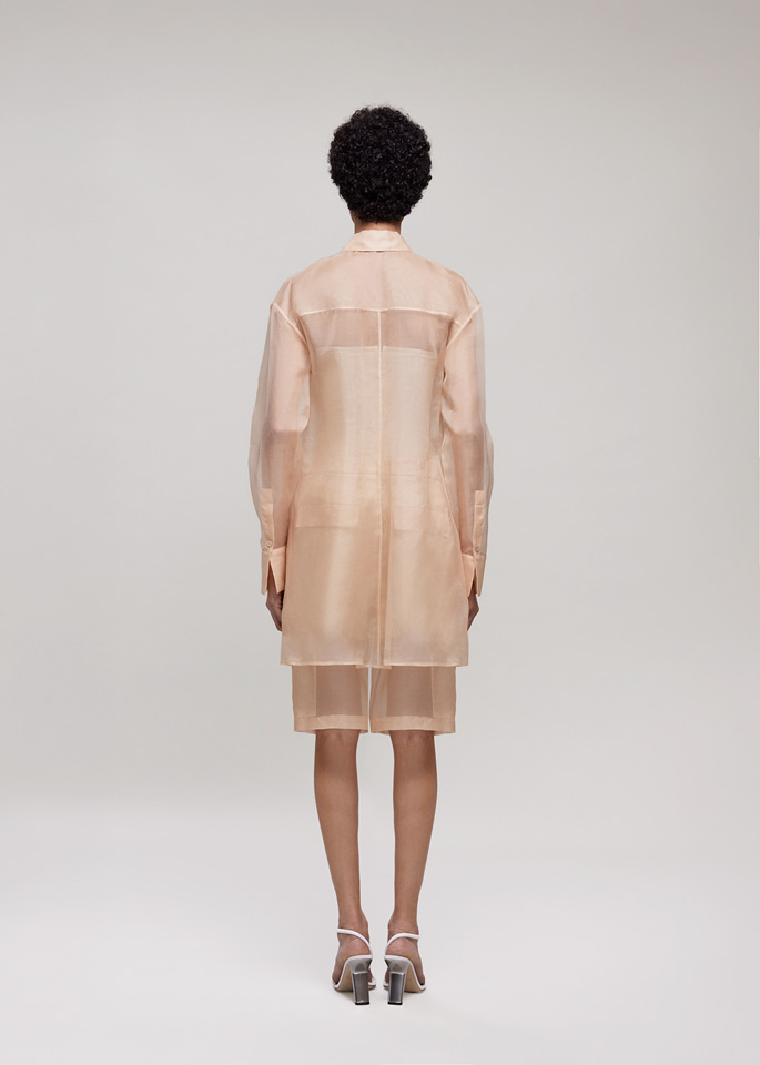 DEL CORE: SHIRT LONGER ON THE BACKWITH FITTED WAIST AND SIDE SPLIT