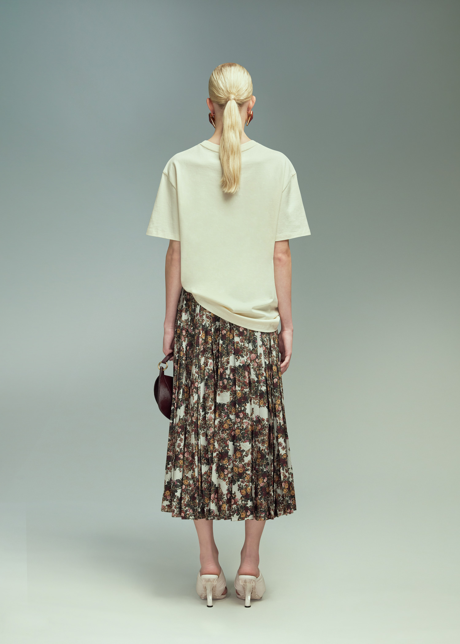 DEL CORE: IRREGULAR PLEATED WRAP SKIRT
