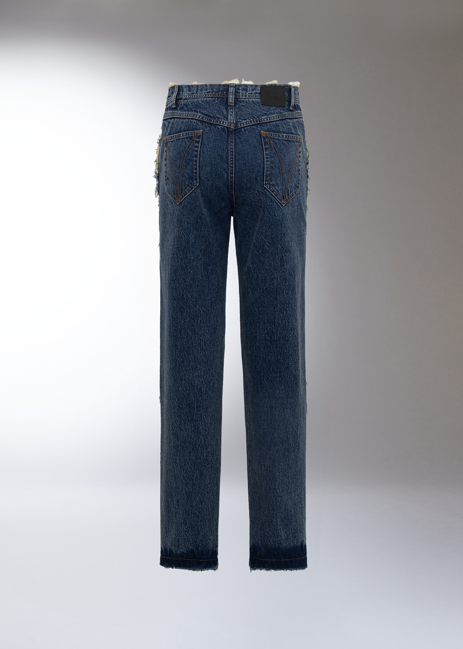 DEL CORE: TAPERED PIECED DENIM TROUSERS